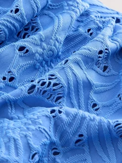 Blauw met broderie - Vormgevend badpak met buikcorrectie