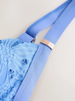 Blauw met broderie - Vormgevend badpak met buikcorrectie