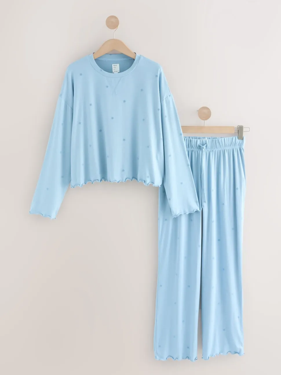 Blauw met sterrenprint - Zachte pyjama met lange mouwen en hartjesprint
