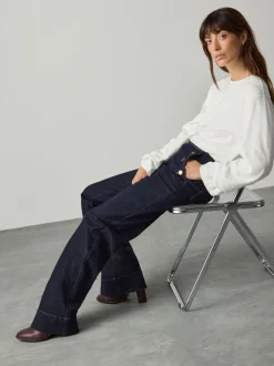 Blauw met wassing - Jeans met wijde pijpen en gouden knopen aan de voorkant