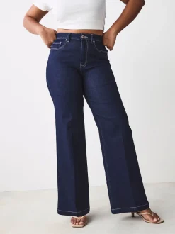 Blauw met wassing - Jeans met zandloperpasvorm en wijde pijpen