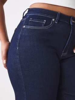 Blauw met wassing - Jeans met zandloperpasvorm en wijde pijpen