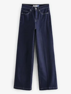 Blauw met wassing - Jeans met zandloperpasvorm en wijde pijpen