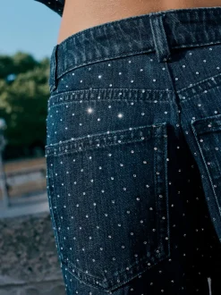 Blauw met wassing - Versierde jeans met wijde pijpen