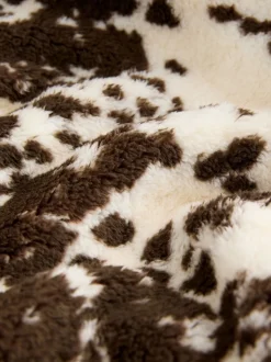 Bruin met koeprint - Borg fleece met korte rits