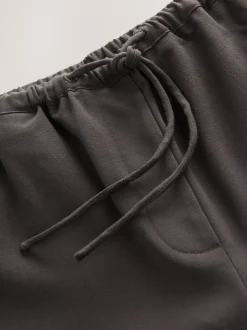 Chocoladebruin - Broek met koordje aan voorkant en wijde pijpen