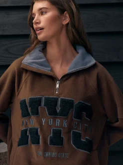 Chocoladebruin - Fleece trui met korte rits