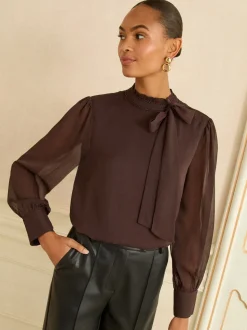 Chocoladebruin - Love & Roses blouse met lange mouwen en striksluiting