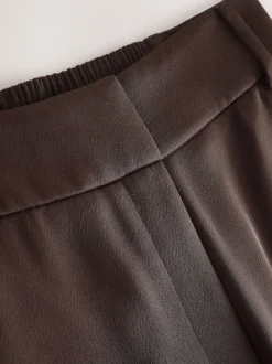 Chocoladebruin - Satijnen broek met wijde pijpen en elastiek in de achterkant