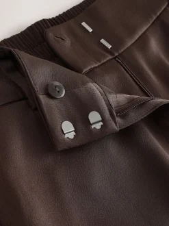 Chocoladebruin - Satijnen broek met wijde pijpen en elastiek in de achterkant