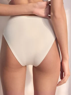 Crème - Vormgevend slipje met buikcorrectie van premium katoenmix