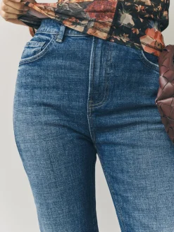 Donkerblauw - Stretch jeans met uitlopende pijpen en hoge taille