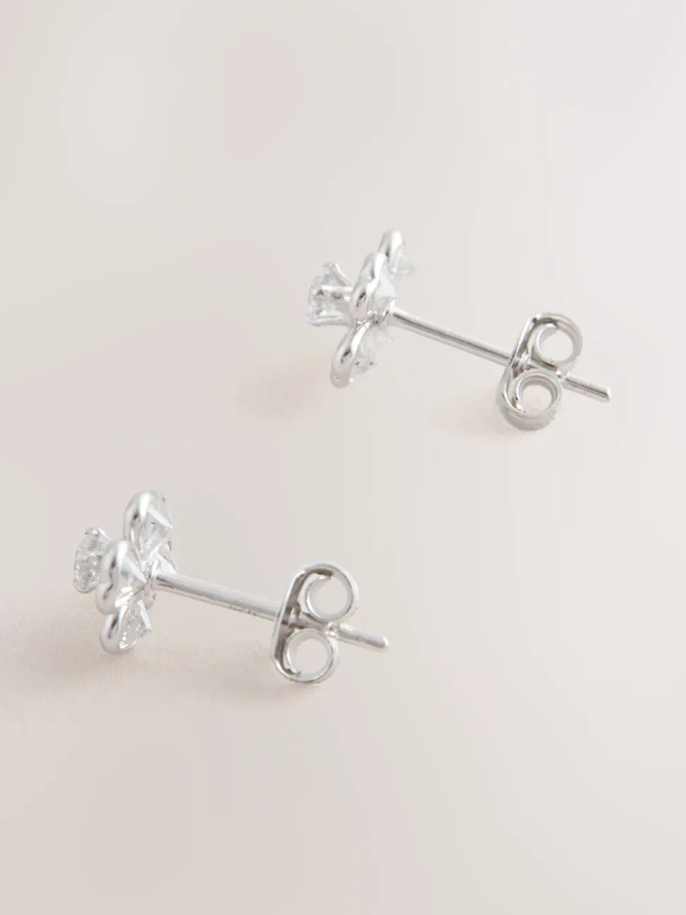 Echt zilver - Glinsterende oorknopjes met bloem