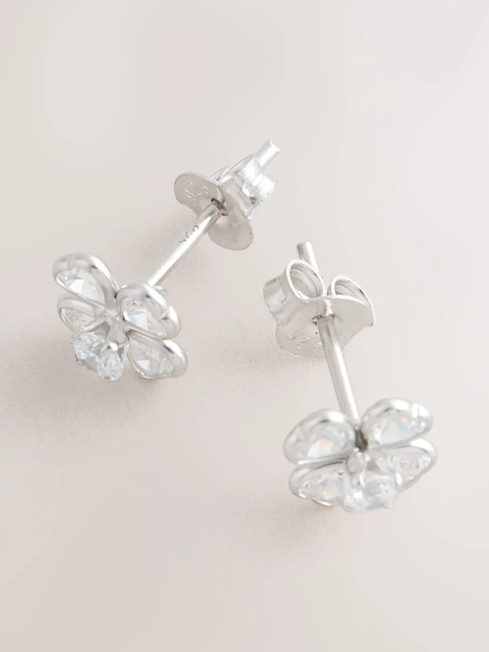 Echt zilver - Glinsterende oorknopjes met bloem