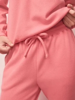 Felroze - Gezellige pyjama met wafeldessin en lange mouwen
