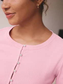 Felroze - self. Geribbelde pyjama met knopen