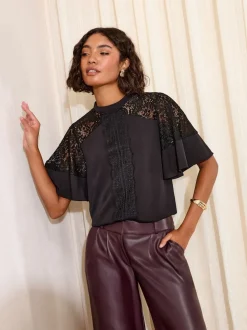 Friends Like These - Kanten blouse met uitlopende mouwen