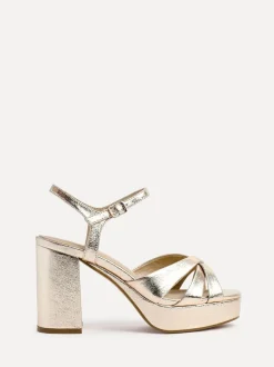 Goud - Linzi Keliah sandalen met plateauzool, gekruiste bandjes en blokhak