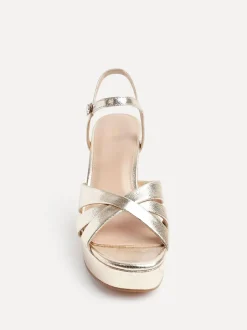 Goud - Linzi Keliah sandalen met plateauzool, gekruiste bandjes en blokhak