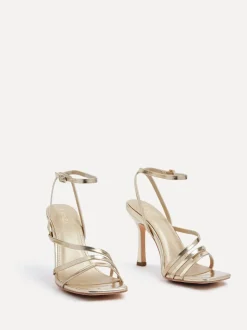 Goud - Linzi Scarlett sandalen met bandjes, hak en enkelbandje