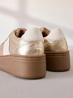 Goud - Signature premium leren sneakers met veters en grove sleehak