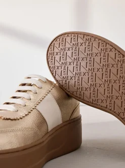 Goud - Signature premium leren sneakers met veters en grove sleehak