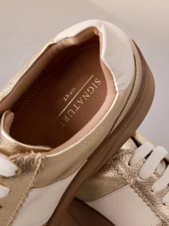 Goud - Signature premium leren sneakers met veters en grove sleehak