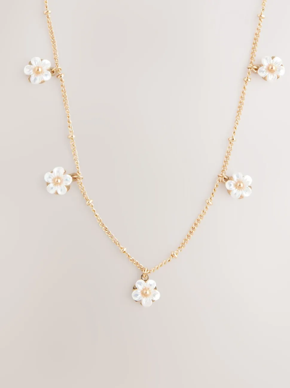 Goudkleurig - Ketting met bloemenhanger
