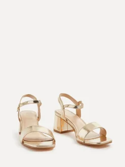Goudkleurig - Linzi Darcie sandalen met lage blokhak en dikke zool