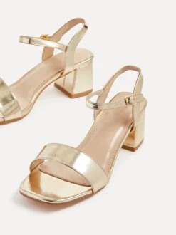 Goudkleurig - Linzi Darcie sandalen met lage blokhak en dikke zool