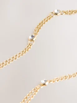Goudkleurig - Oorbellen met glitterdetail