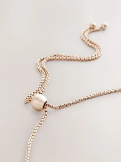 Goudkleurig - Pully ketting met glinsterende pareleffect