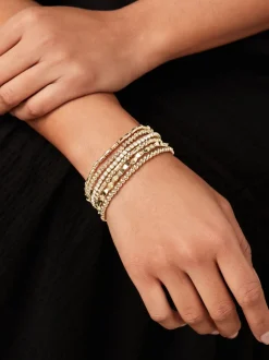 Goudkleurig - Set van glinsterende rekbare armbanden