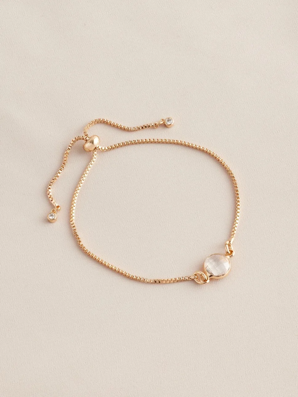 Goudkleurig - Trekarmband met geboortesteen
