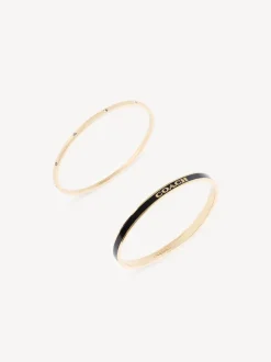 Goudkleurig/zwart - COACH COACH goudkleurige Signature Duo Bangle set in doosje