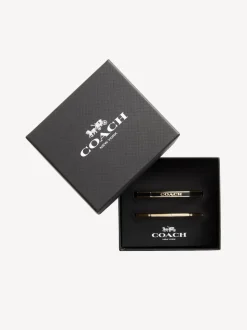 Goudkleurig/zwart - COACH COACH goudkleurige Signature Duo Bangle set in doosje