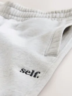 Grijs - self. joggingbroek met wijde pijpen