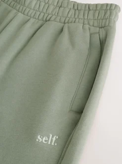 Grijs-groen - Self. joggingbroek met boorden