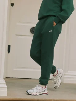 Groen - Self. joggingbroek met boorden