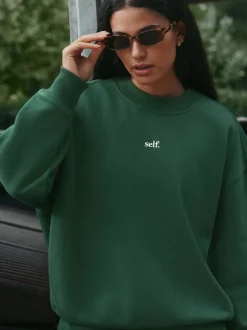 Groen - Self. joggingbroek met boorden
