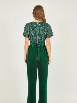 Groen - Yumi jumpsuit met engelmouwen, van fluweel en versierd met lovertjes