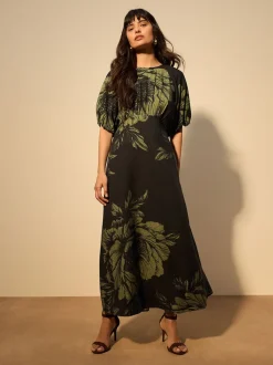 Groen bloemmotief - Midi-jurk met print en pofmouwen