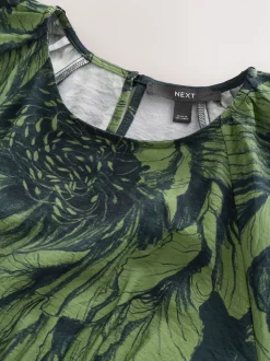 Groen bloemmotief - Midi-jurk met print en pofmouwen