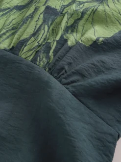 Groen bloemmotief - Midi-jurk met print en pofmouwen