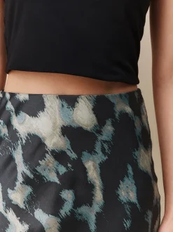 Groen met dierenprint - Satijnen midirok