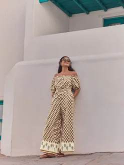 Kakigroen - Jumpsuit met blote schouders en wijde pijpen van 100% katoen