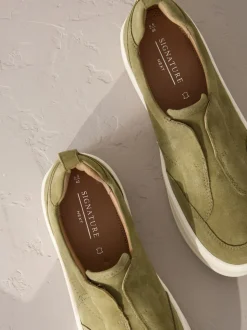 Kakigroen - Signature leren sneakers met dikke plateauzolen en sleehak