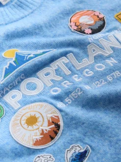 Licht Blauwe badge borduurwerk - Gebreide trui met ronde hals van wol