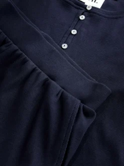 Marineblauw - self. Geribbelde pyjama met knopen