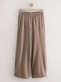Nertsgrijs/bruin - self. joggingbroek met wijde pijpen